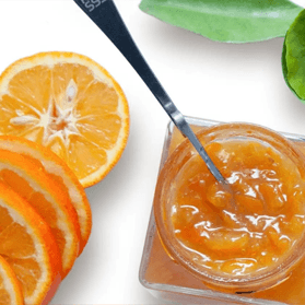 mermelada de naranja con trozos de naranja