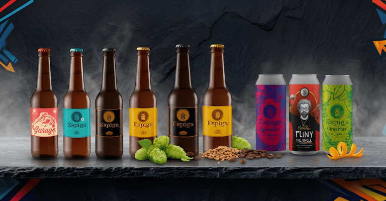 latas y botellas de cervezas Espiga, una marca artesanal conocida por elaborar cervezas naturales, creativas y de gran calidad, con un fuerte protagonismo de los lúpulos frescos.